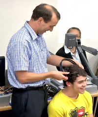 Volunteer demonstrating an EEG headset